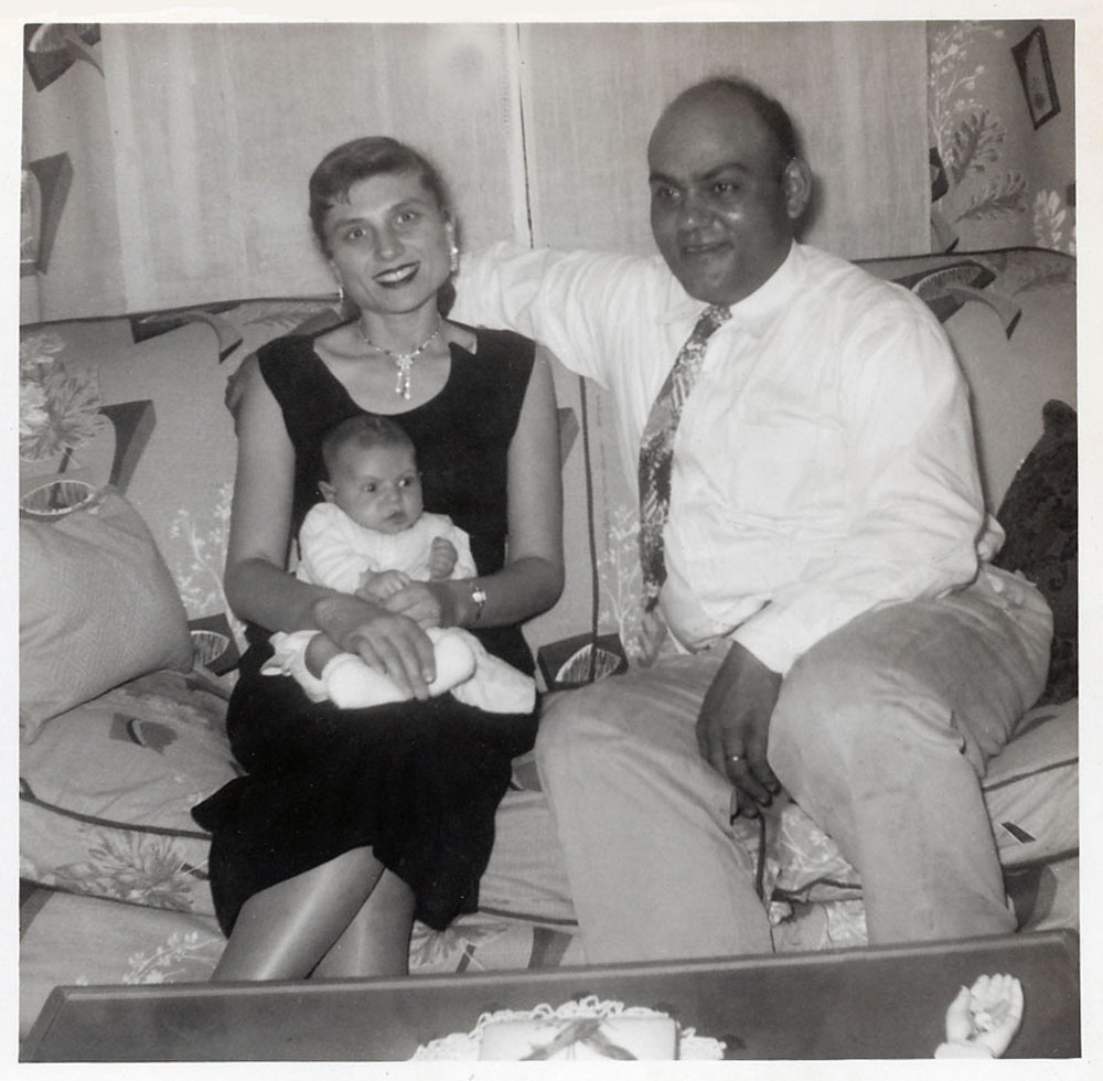 Phyllis and George Tabakian holding Kim